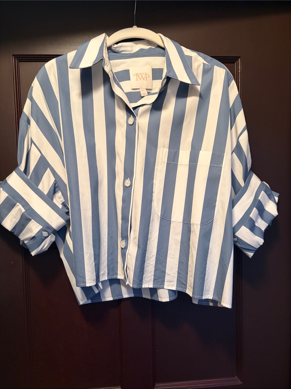 Blue & White Striped TWP button down with signature buttoned sleeves.